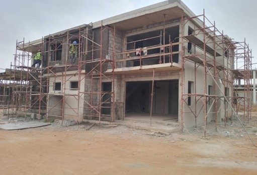 Multi-storey building under construction with scaffolding