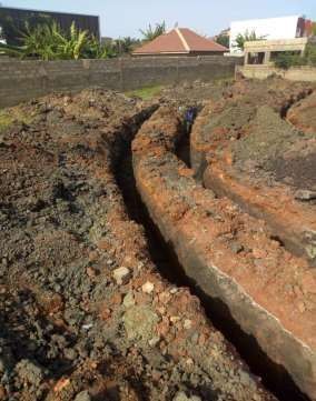 Excavated service trenches on site