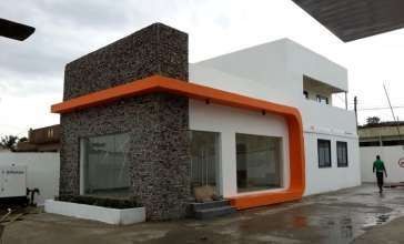 Modern shopfront with stone cladding