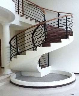 Sculpted white spiral staircase